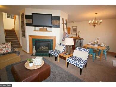A ceramic tile surrounded, gas fireplace is availa