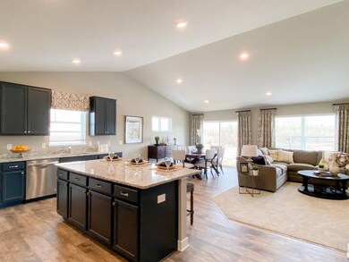 You can see the open-concept main level at work he