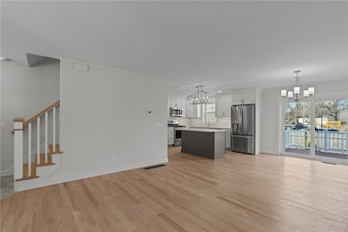 Large, front-to-back open concept living and dinin