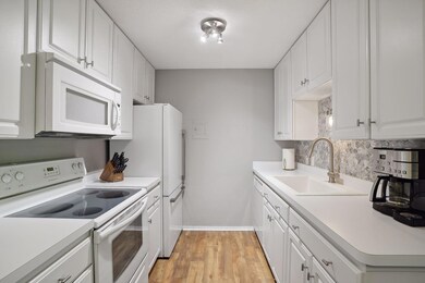 Marble backsplash in sink area