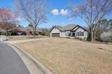 View of front of home featuring a front yard, an a