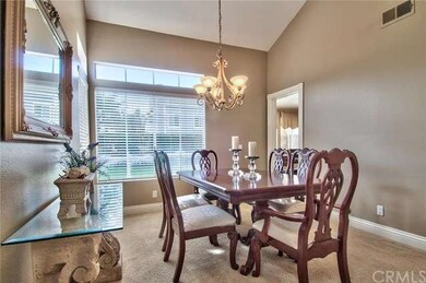 The formal dining room. The door in the background