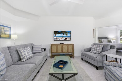 Living room featuring a ceiling fan