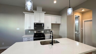Pendumum lighting creates an intimate feel in the