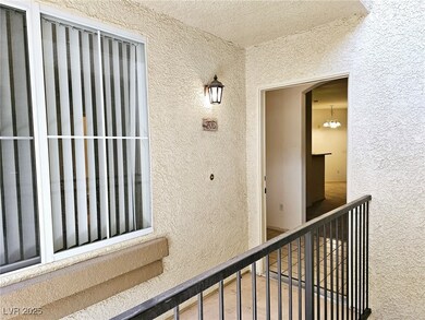 View of exterior entry featuring a balcony and stu
