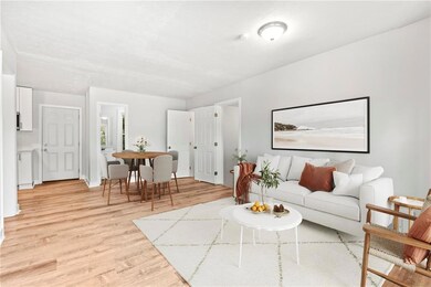 Living area featuring light wood-style floors