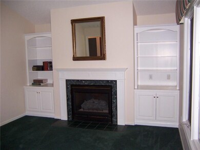 Living room with gas fireplace, built-in