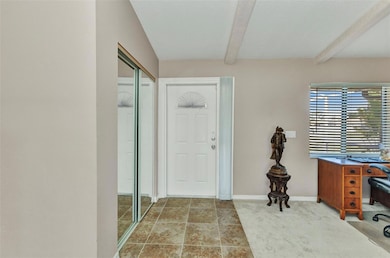 Open floor plan with cathedral ceilings.