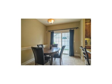 Huge breakfast area with tile floors and sliding f
