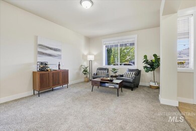 Sitting room with light colored carpet