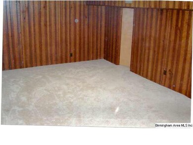 Den located Downstairs