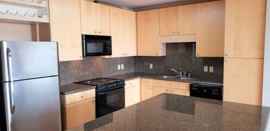 Lots of storage, granite back splash and wine hold