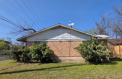 View of home's exterior with brick siding