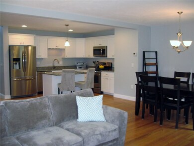 Living Room open to Dining Room and Kitchen
