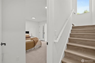 Lower level entry. Model home. Colors and finishes may vary.