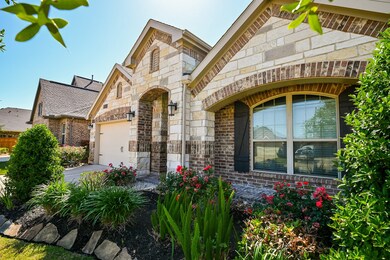 Well maintained yard with manicured landscaping.
