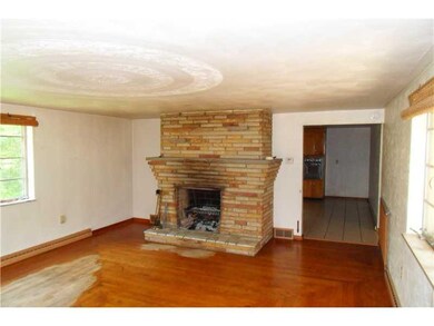 Living Room. Gorgeous and cozy stone fireplace and