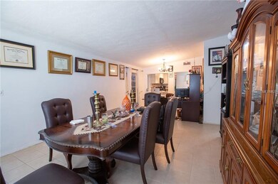 What is now the dining room was previously the living room area with the dining area where the office set up is located now.