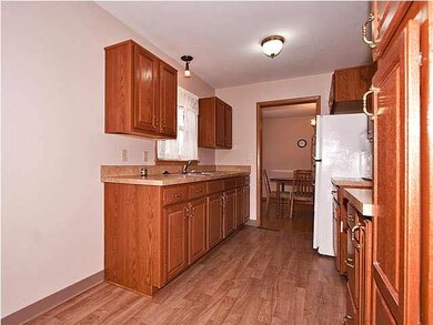 New kitchen cabinets, counters, and flooring