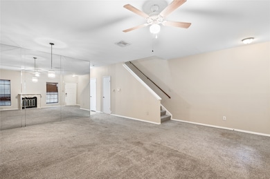 Living and dining area looking toward kitchen.