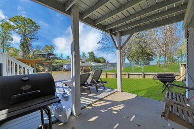Downstairs covered patio area.
