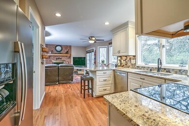 Kitchen OPENS into Family Room.