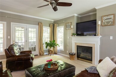 Living room with screened porch beyond