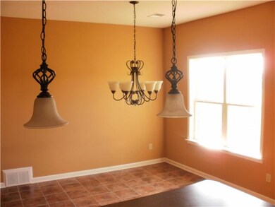 View of the eating area in the kitchen..tile floor