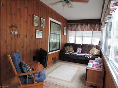 Relax on the front porch with wall of windows and 