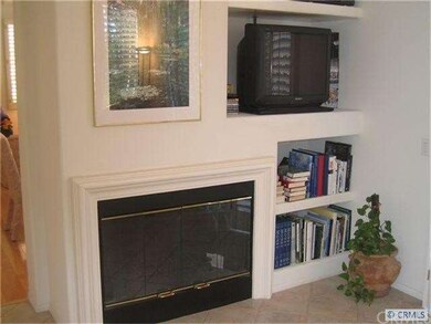 Cozy fireplace area with built-ins