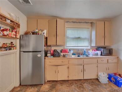 Kitchen with appliances with stainless steel finis