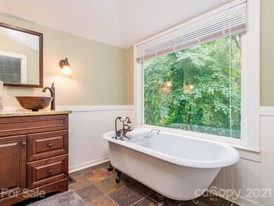 The master bathroom features this clawfoot soaking