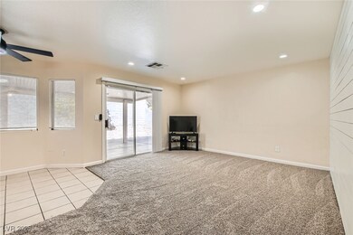 Family room with ceiling fan, visible vents, reces