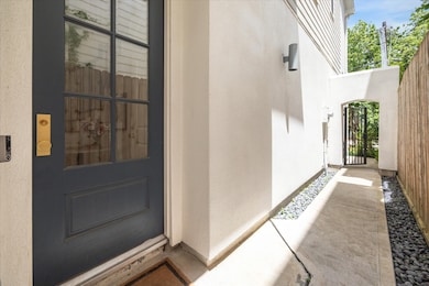 A beautiful front door tucked away behind a secure