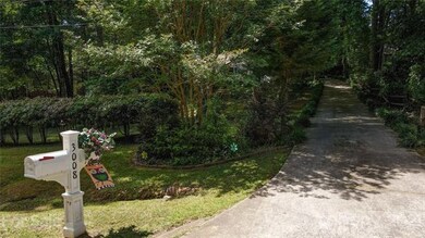 View from street of your mailbox and a long drivew