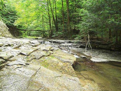 Land. You can relax on the rock ledge and listen t