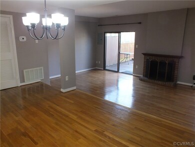 Open floor plan offers ample outdoor lighting. Doo