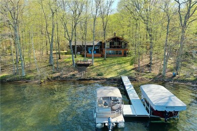 lifts negotiable - 100' lake shore with sloping lake side yard
