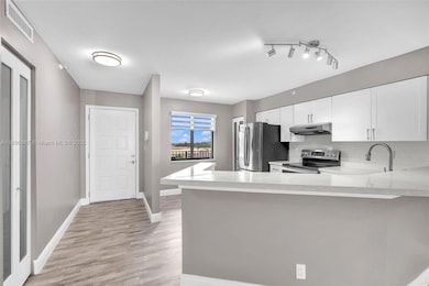 2112 S Cypress Bend Dr unit 802, Pompano Beach, FL 33069 - photo 2