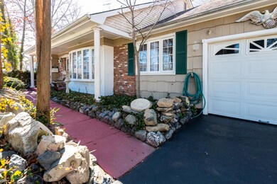 Newer garage door and bay window