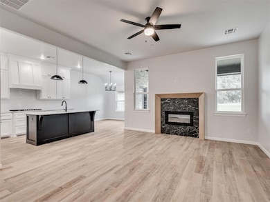 Kitchen featuring light hardwood / wood-style floo