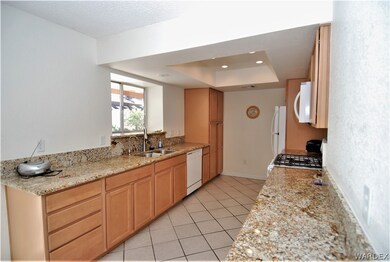 Remodeled modern kitchen with granite counters, ne