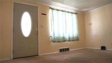 The other side of the living room, with an invitin