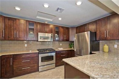 New Kitchen With Custom Dark Cabinets, Granite Cou