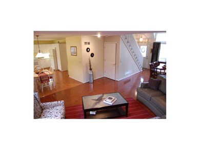 Open entry area to vaulted ceilings and shown in t
