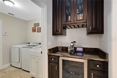 Laundry room and dry bar.