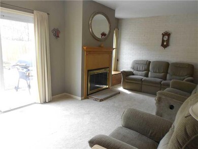 Living Room. Slider to rear yard and log burning f