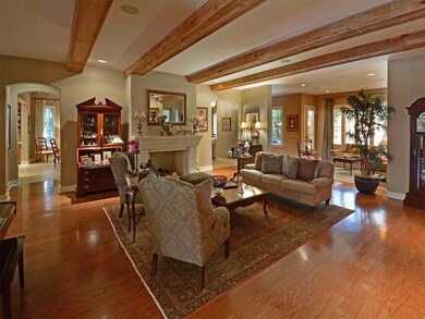 The light-filled home includes a charming living r