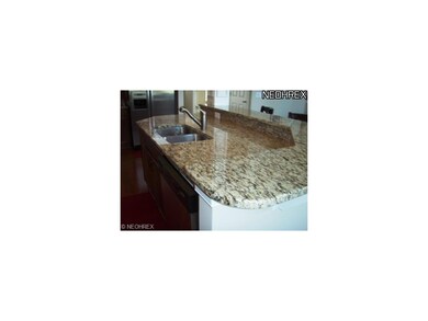 Oversized sink area with breakfast bar.