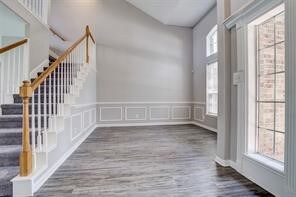 This front room, with an abundance of natural light, can have many uses.